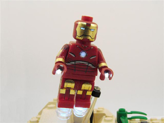 Illustration for article titled LED LEGO Iron Man Minifig Explodes With Boozy Charm, RPG Rounds